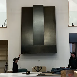 blackened steel range hood